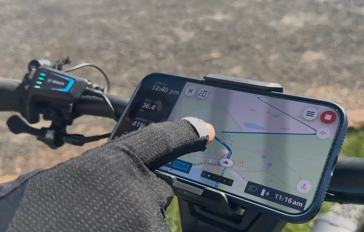 Bosch eBike Flow App navigation screen showing an eMTB route near Mount Coot-tha with arrival battery estimate