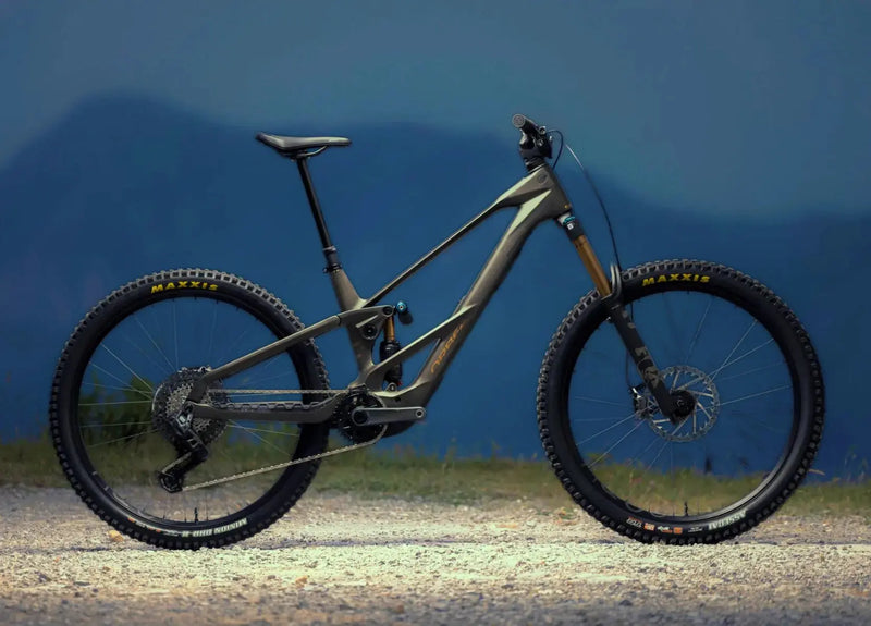 Orbea Wild LT electric mountain bike with Fox Factory suspension and Maxxis tyres in side profile.