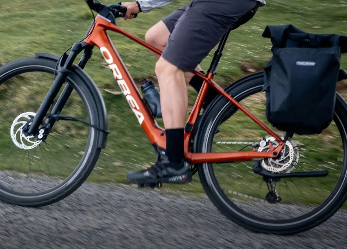 Orbea Ebike commuter eBike fitted with mirror, rack and panniers at Electric Bikes Brisbane