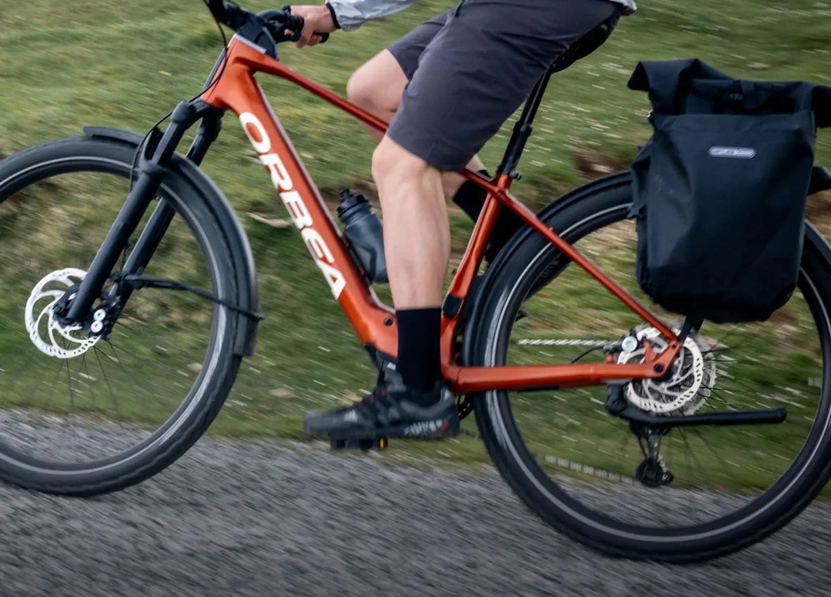 Orbea Ebike commuter eBike fitted with mirror, rack and panniers at Electric Bikes Brisbane