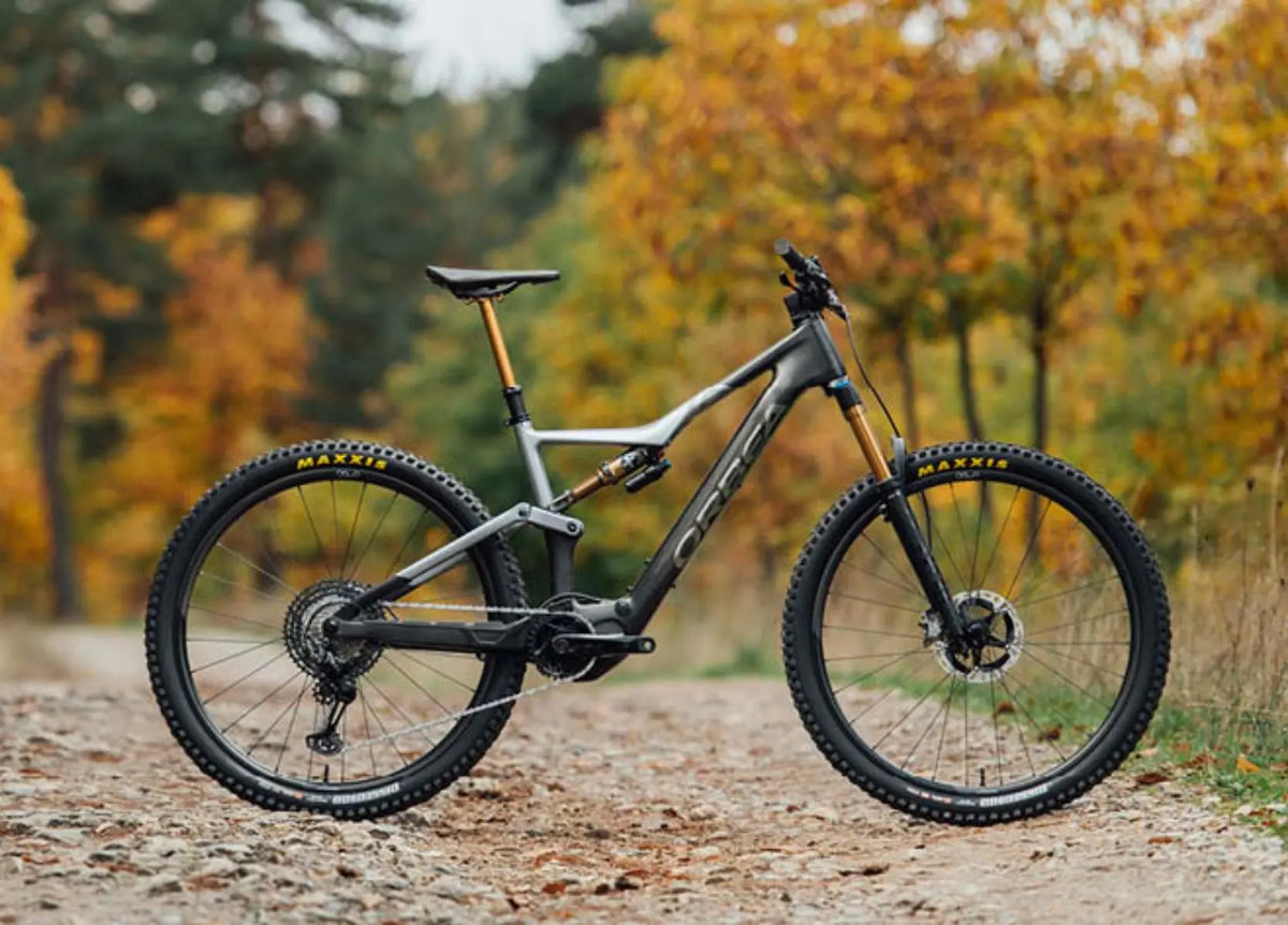 Orbea Rise lightweight electric mountain bike 2023 on a forest trail