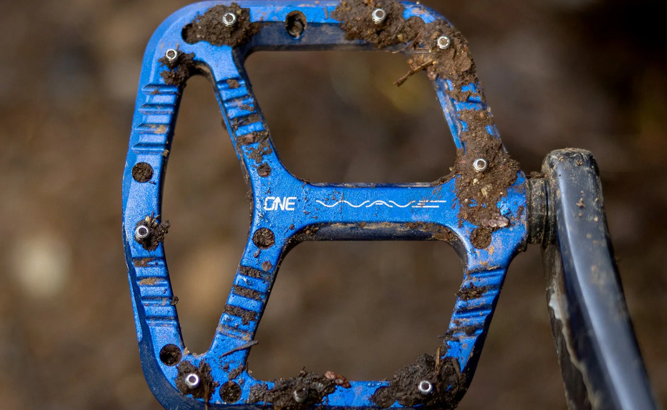 OneUp Wave Pedals Dark Blue with Mud dirt | Electric Bikes Brisbane