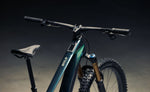 Orbea Wild LT electric mountain bike cockpit showing integrated Avinox display, carbon frame and Fox suspension.