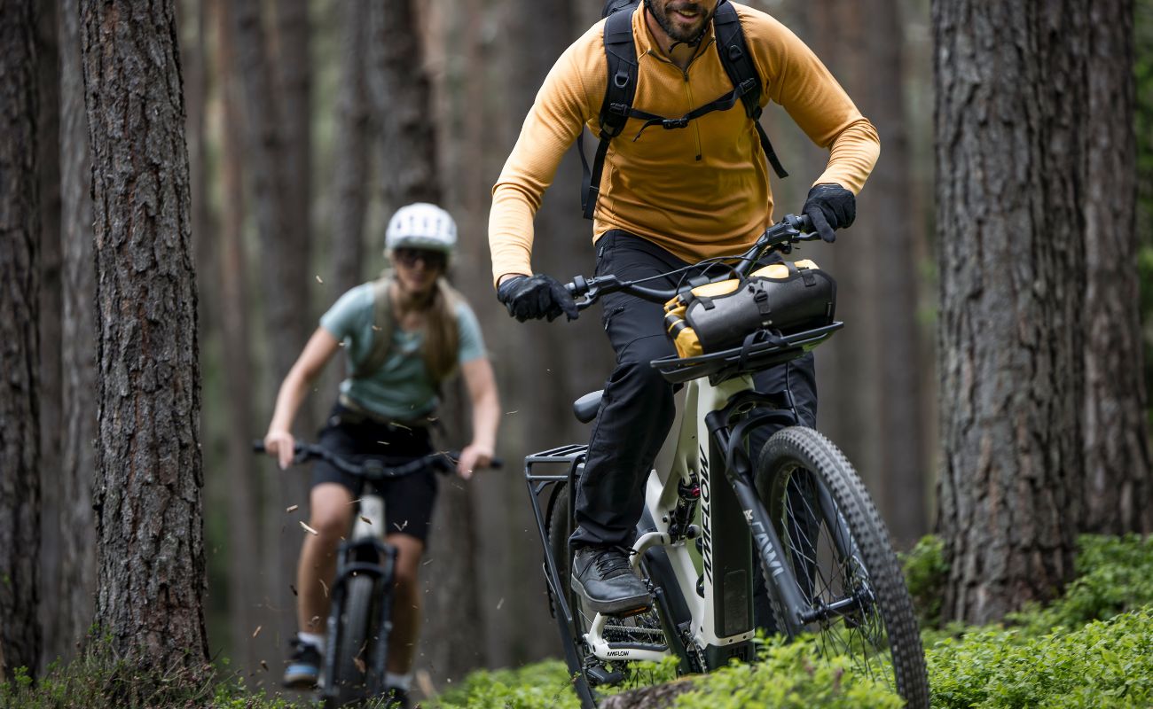 Amflow TL Carbon riding forest trail with loaded front rack Brisbane