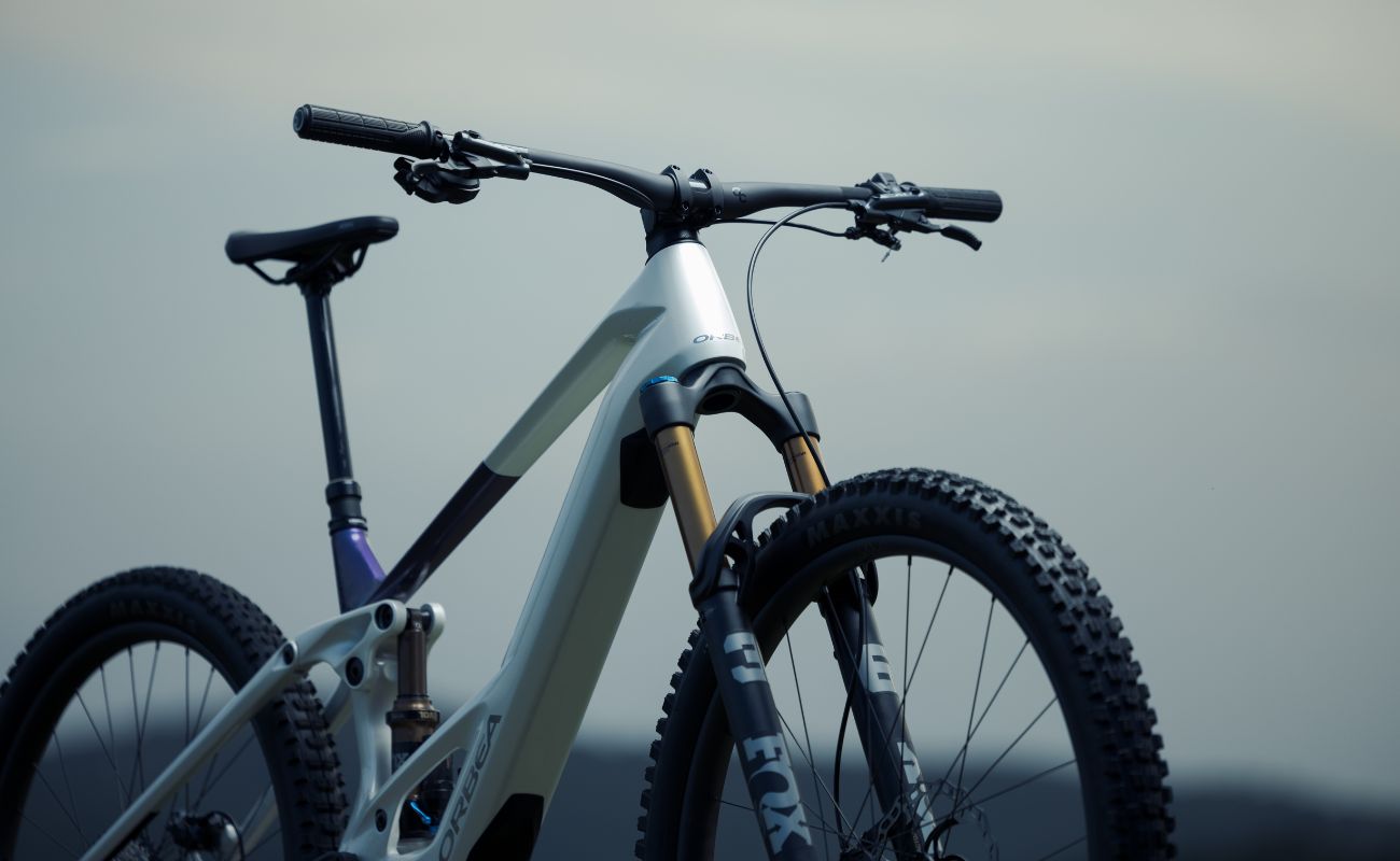 Orbea full-suspension eMTB close-up with FOX Factory suspension and Maxxis tyres