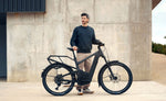 Riese & Müller Delite5 Offroad full suspension electric bike with rider