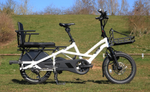 Tern GSD R14 Gen 3 Cargo EBike with a large front wheel and small rear wheel on a grassy field. | Electric Bikes Brisbane