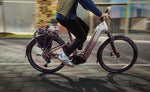 Focus Aventura2 FS Wave E-Bike being ridden on a city street