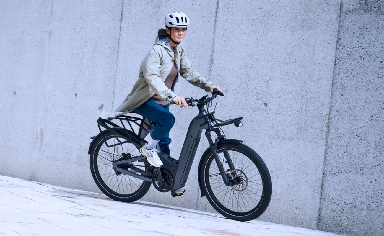Riese & Müller Homage5 Vario E-Bike being ridden on an urban path