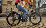 Focus Aventura2 FS 6.7 Wave E-Bike rider commuting on a city street