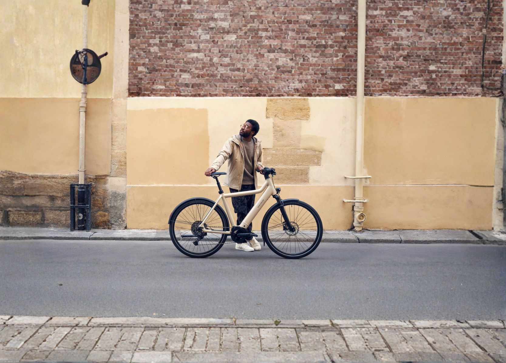 Rider beside a Bosch Performance Line SX electric bike in a city setting | Electric Bikes Brisbane