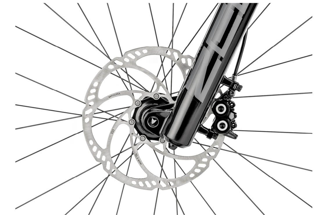 Close-up of bottom of Rockshox ZEB Select forks with Magura MT5 brakes and brake rotor | Electric Bikes Brisbane