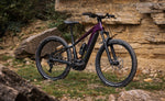 Focus F26 Jarifa2 6.7 Hardtail E-MTB on a rocky trail with a natural stone wall background | Electric Bikes Brisbane