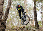 Focus Sam2 6.7 Electric Mountain Bike getting air being tested by Flow Magazine