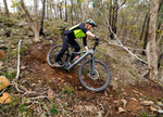 Focus Sam2 6.7 Electric Mountain Bike taking a loose off camber corner | being tested by Flow Magazine