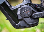 Bosch Sam2 6.7 E-MTB, Bosch CX electric bike motor unit with blurred green background
