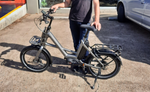 Person holding a Kalkhoff Endeavour C.B Move+ EBike on a street | Electric Bikes Brisbane