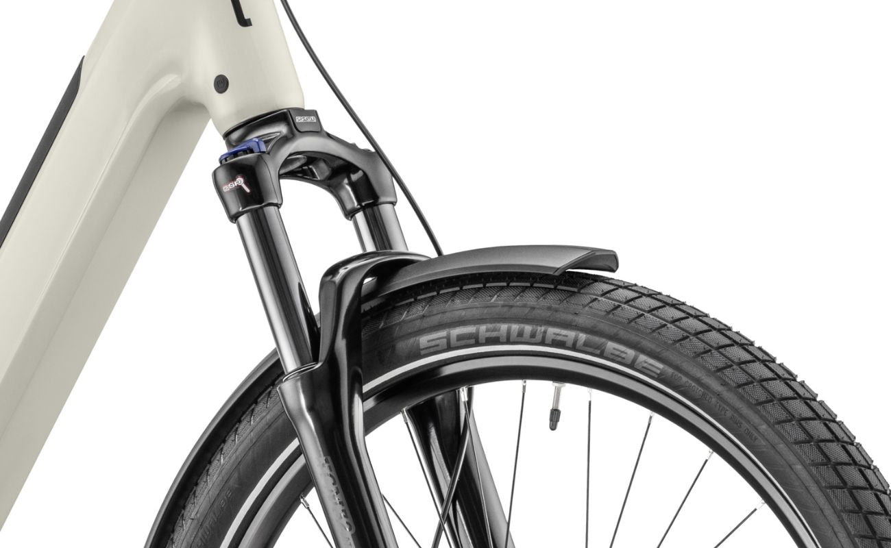 Close-up of a Moustache Mardi 27.4 E-Bike  wheel with a Schwalbe tire on a white background | Electric Bikes Brisbane