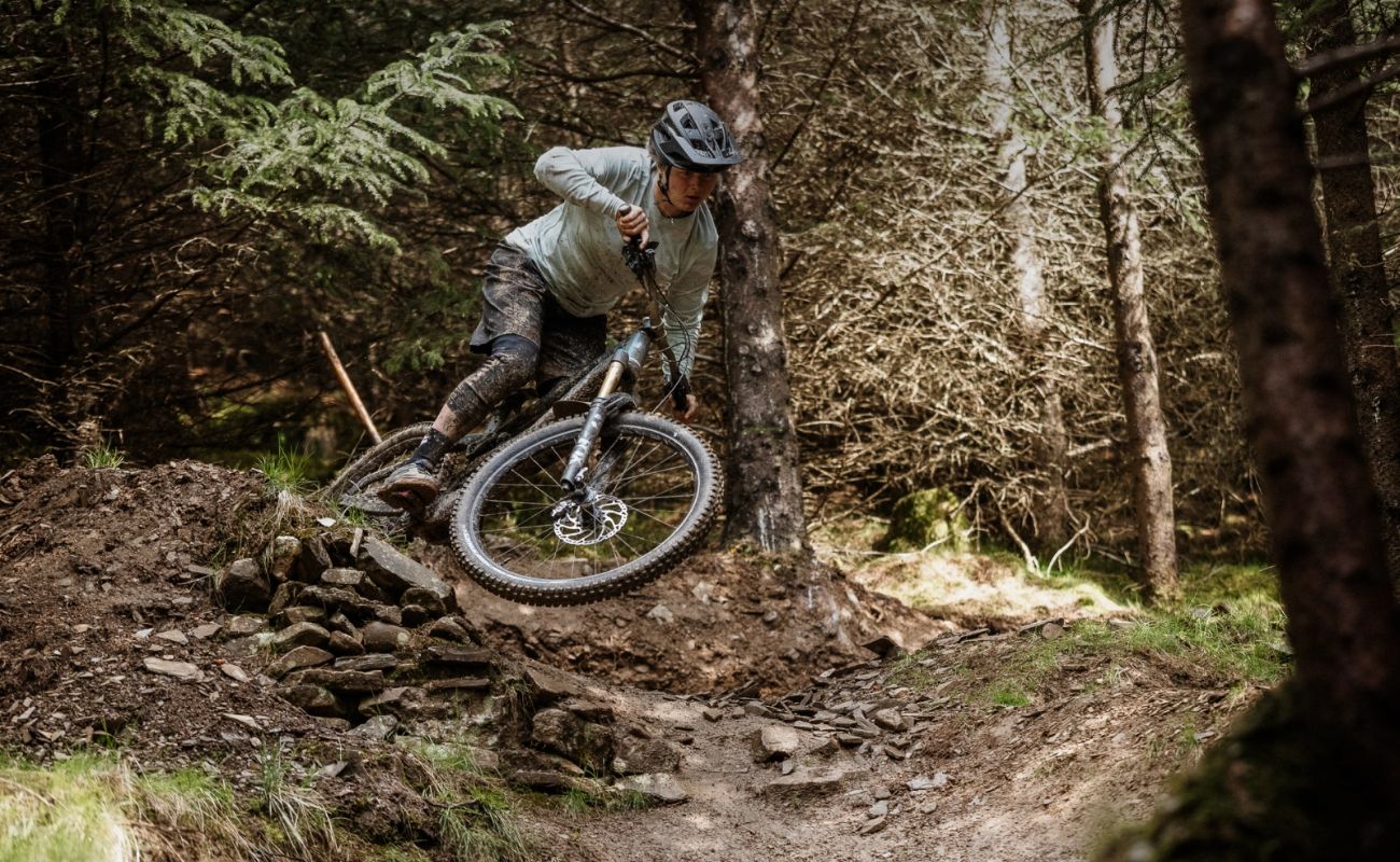 Orbea Wild LT H10 Racing Green rider descending technical forest trail electric bikes Brisbane