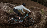 Orbea Wild LT Racing Green eMTB cornering on rocky trail electric bike Brisbane