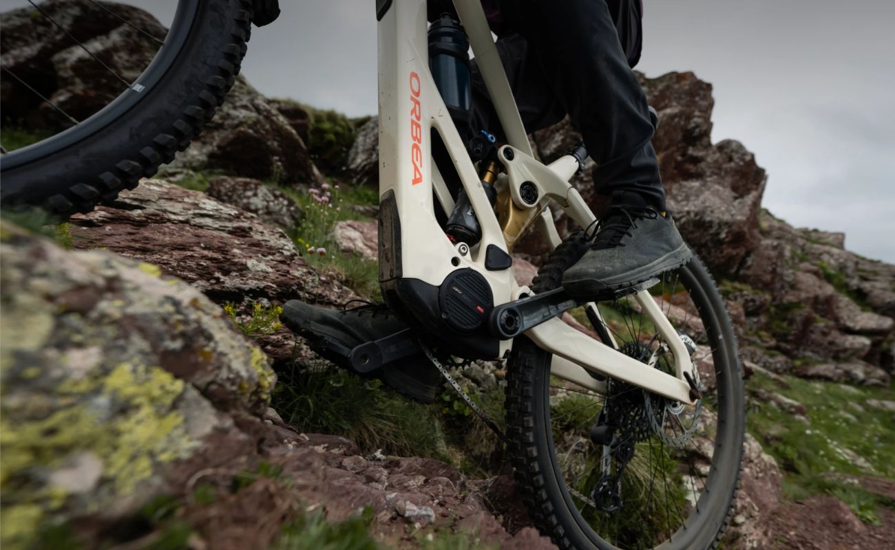 Orbea Wild LT H20 2027 eMTB climbing rocky terrain with Avinox M2 motor | Electric Bikes Brisbane