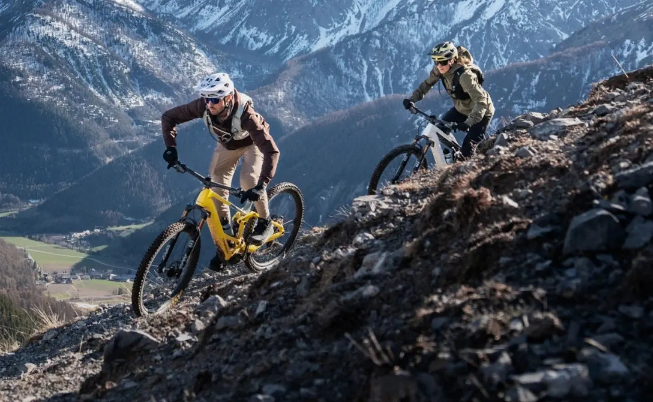 Orbea Wild TR eMTB riders climbing steep technical mountain trail