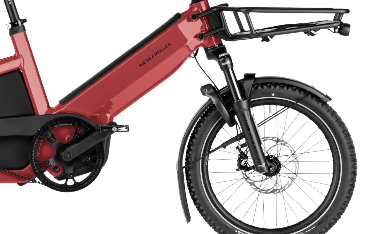 Red electric bike with black components on a white background | Electric Bikes Brisbane