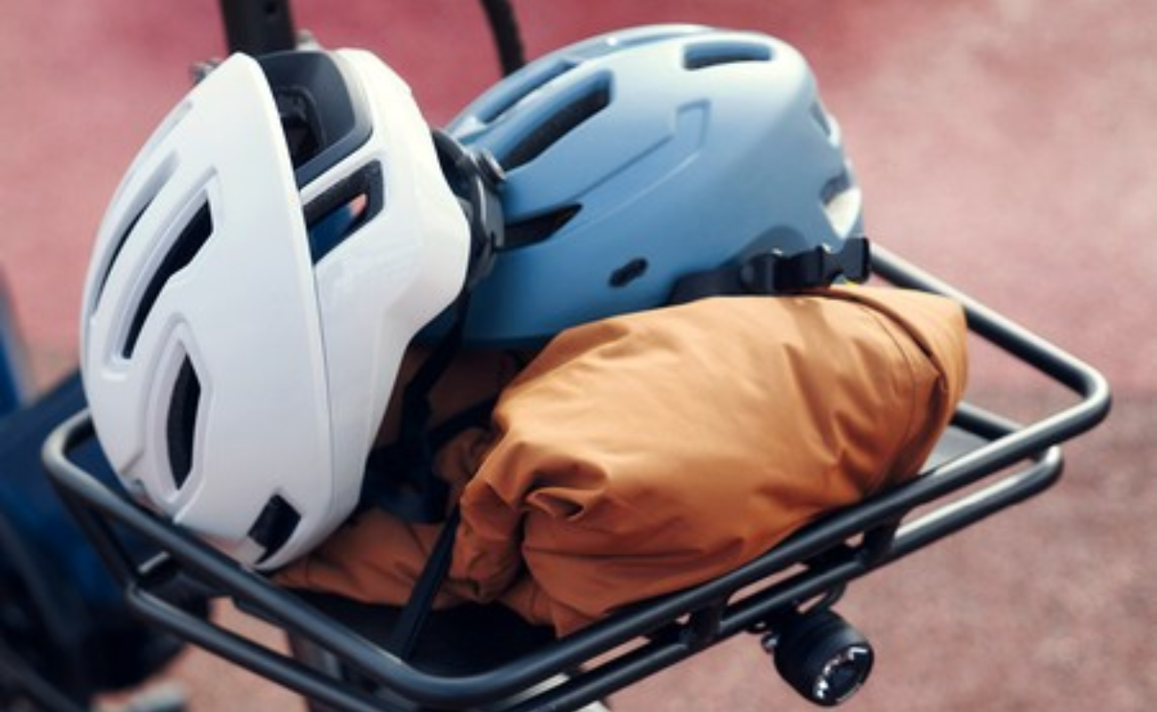 Two helmets and a jacket on a front carrier of Riese & Muller Multitinker2 Vario Cargo EBike | Electric Bikes Brisbane