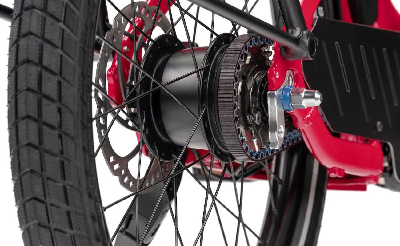 Close-up of the Tern HSD electric bike’s belt drive, rear hub and disc brake.