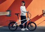 Lady holding Riese & Müller Tinker2 EBike | Electric Bikes Brisbane